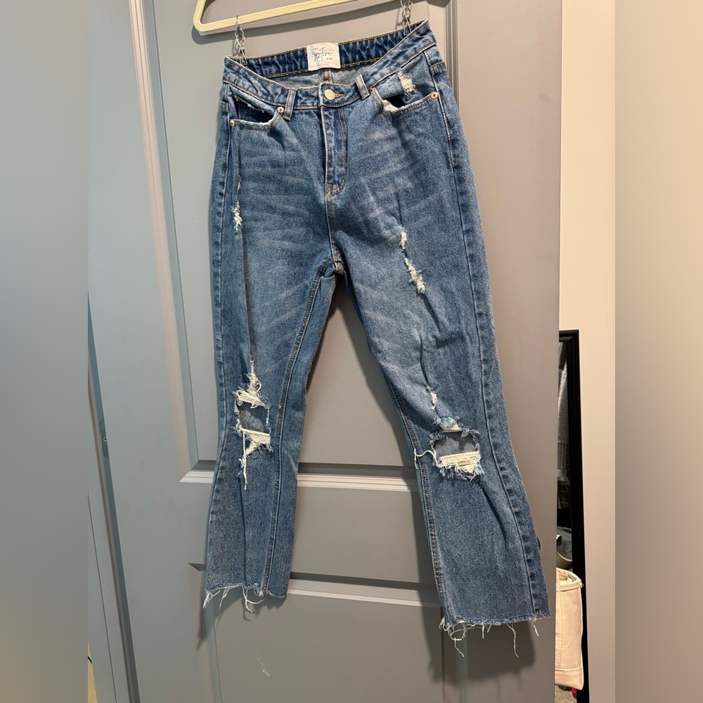 Distressed Blue Jeans